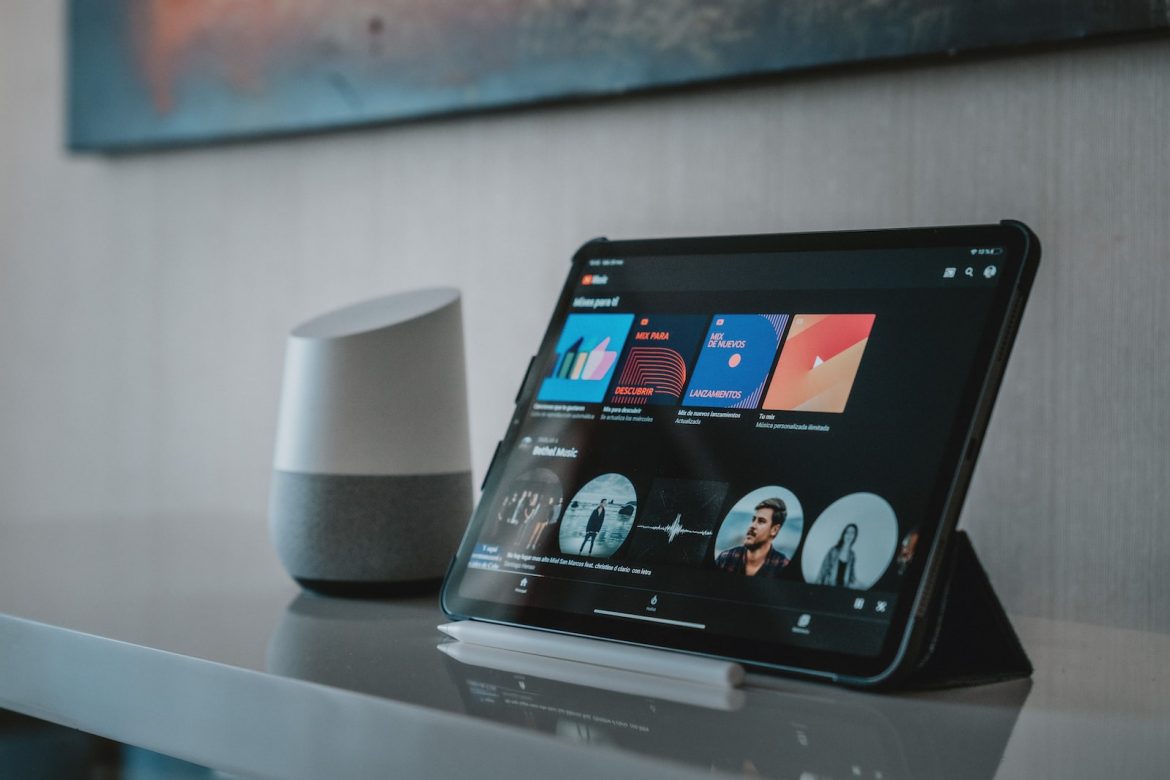 black tablet computer on white table